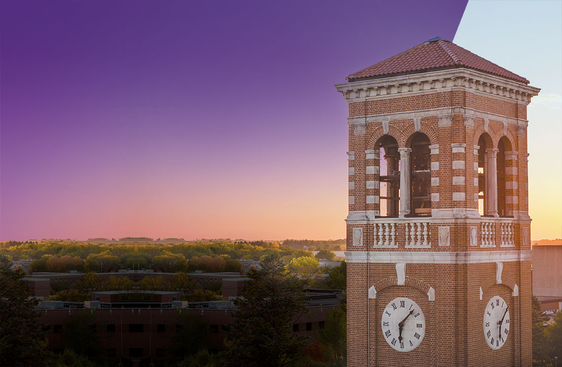 UNI Campanile during a sunset with a purple gradient background