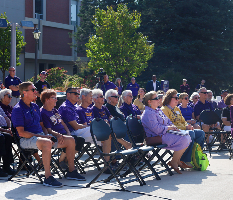 UNI alumni and friends gather on the Campanile Plaza