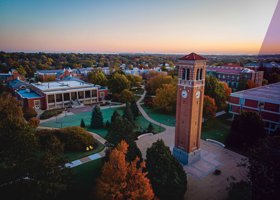 Wide shot of the Campanile at sunset-the image shows a lot of the remainder of the UNI campus as well