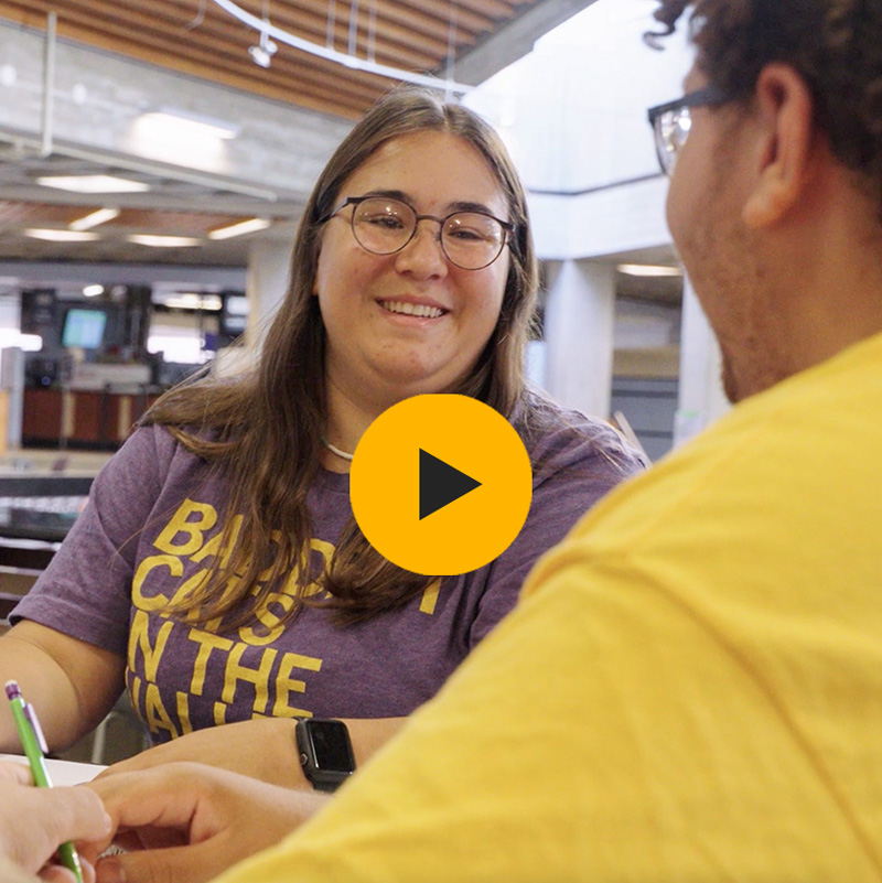 Video play button-Diana Espinoza with a friend in the Maucker Union