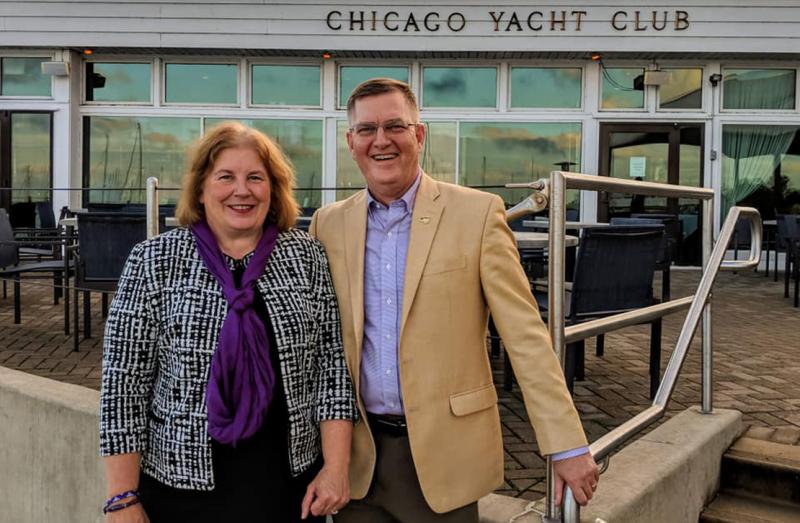 UNI President Mark Nook & Cheryl Nook in front of the Chicago Yacht Club