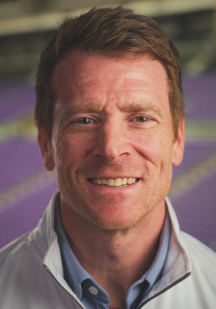 UNI head football coach Todd Stepsis smiling at the camera.